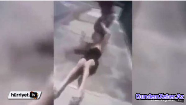 Əri ilə gəzən qadını körpüdən atdı - VİDEO (16+)