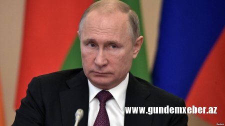 Almaniyada Putinin casus vəsiqəsi tapılıb