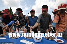 ​ŞOK: Festivalda itləri diri-diri yandırıb, yedilər