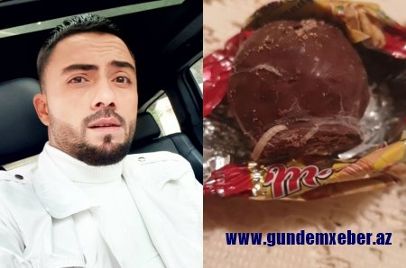 "Rahat" marketdən alınan şokoladın içindən qurd çıxdı - Video