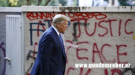 Tramp etirazları yatırmaq üçün mülki və hərbi resursları səfərbər edir