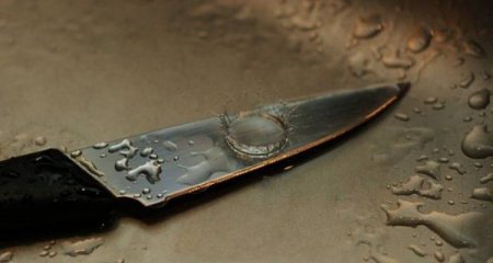 Bakıda dəhşətli qətl: Anasının başını kəsdi