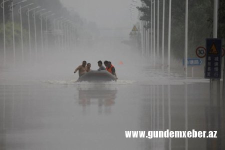 Çində şəhər merinin müavini və siyasi komissar daşqında həlak oldular